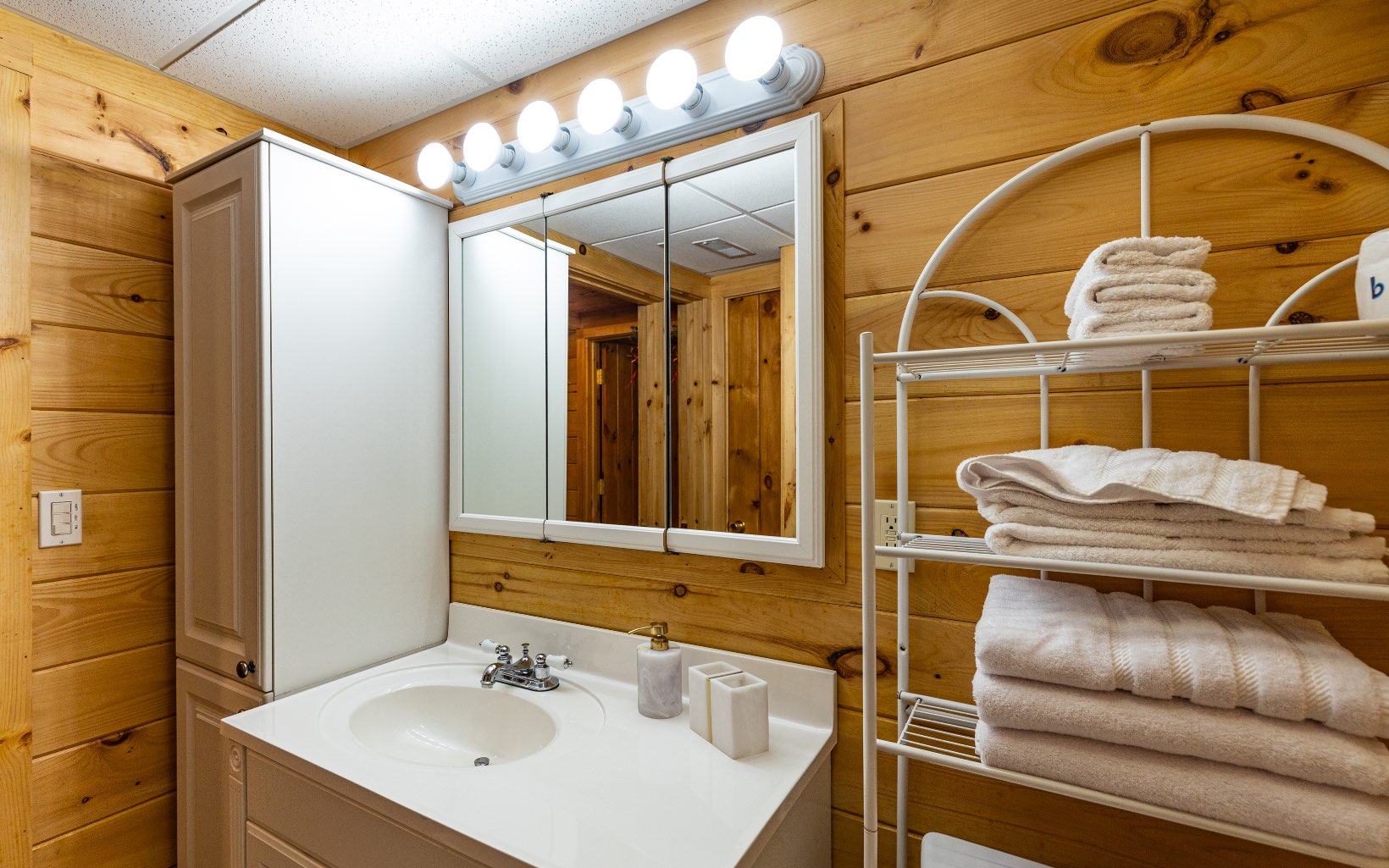 271 Rolling Hill Morganton, GA 30560 - Photo 55 of 69 a bathroom with a sink and a mirror