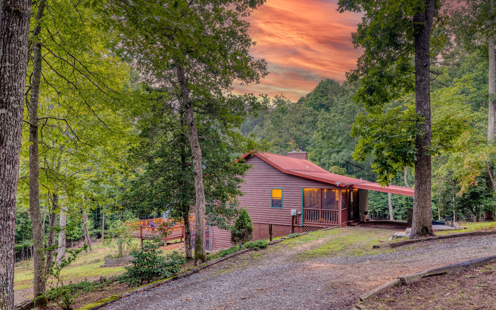 271 Rolling Hill Morganton, GA 30560 - Photo 6 of 69 a front view of a house with a yard and trees