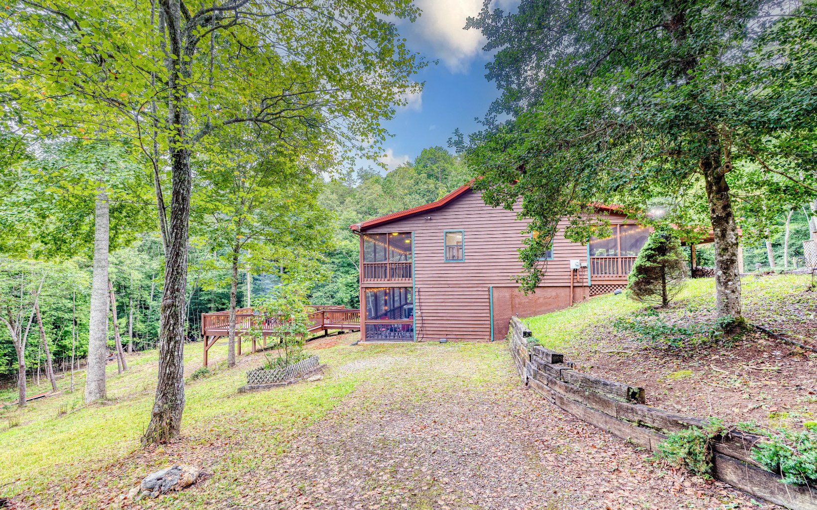271 Rolling Hill Morganton, GA 30560 - Photo 9 of 69 a view of a house with backyard porch and sitting area
