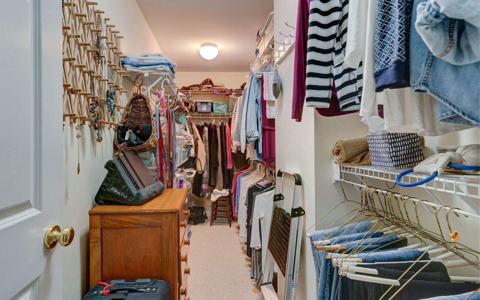 360 Apache Trail Chatsworth, GA 30705 - Photo 19 of 41 a view of walk in closet with clothes and shoes