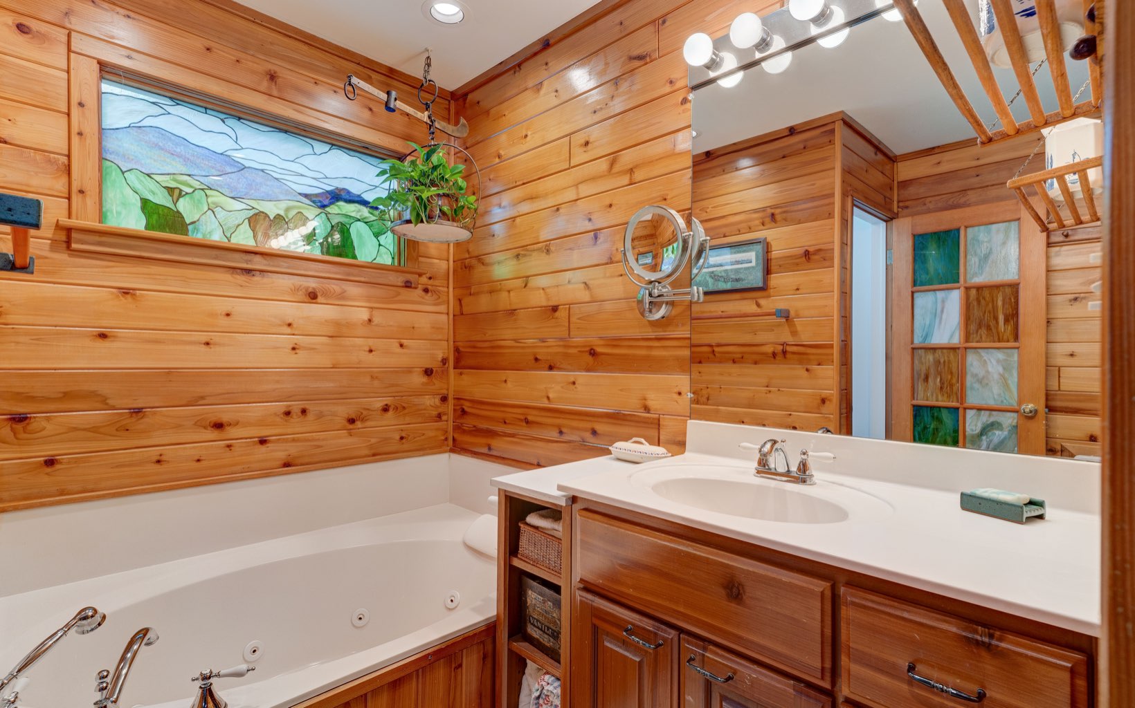 360 Apache Trail Chatsworth, GA 30705 - Photo 22 of 41 a bathroom with a sink and a bathtub