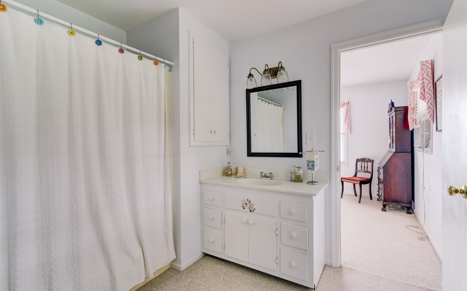 360 Apache Trail Chatsworth, GA 30705 - Photo 28 of 41 a bathroom with a double vanity sink and a mirror