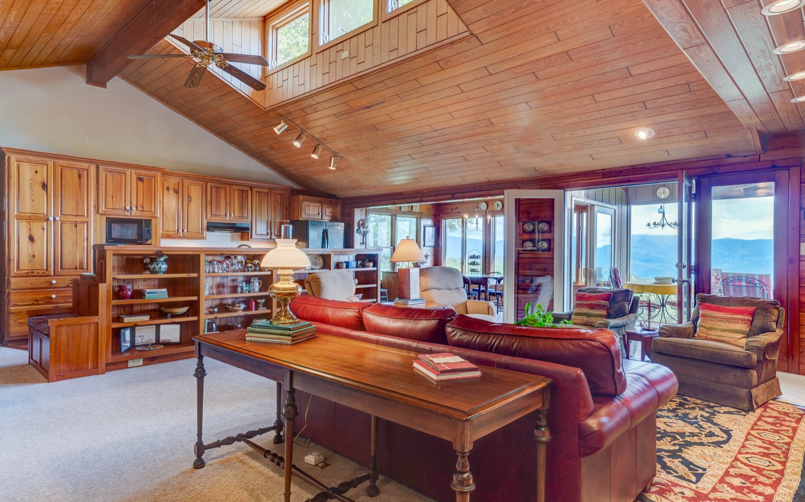 360 Apache Trail Chatsworth, GA 30705 - Photo 9 of 41 a living room with furniture a table and chairs