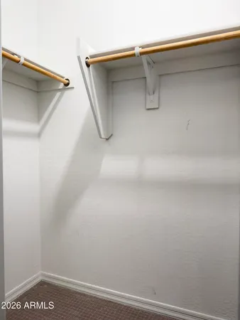 a bathroom with a sink toilet vanity and shower