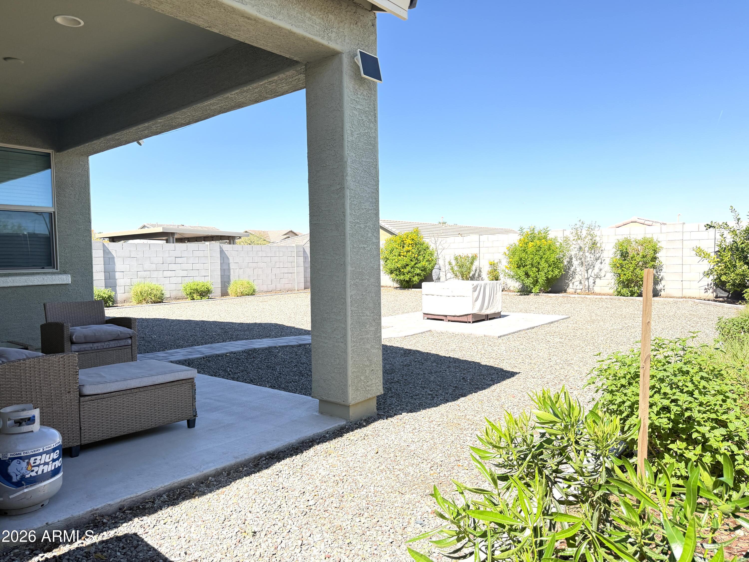 2314 East Harwell Road Phoenix, AZ 85042 - Photo 28 of 32 a view of living room with furniture and a garden