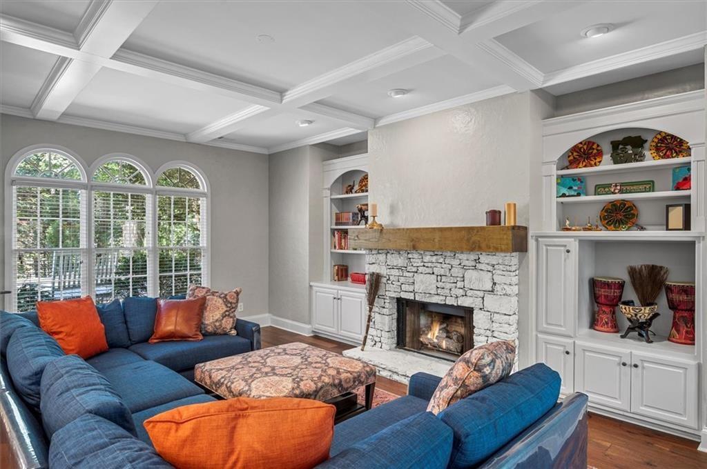 130 Belvedere Court Atlanta, GA 30350 - Photo 12 of 59 a living room with furniture fireplace and a large window