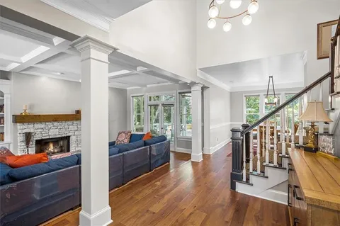 a kitchen with stainless steel appliances a sink a stove a refrigerator and cabinets