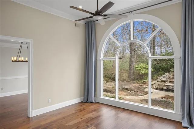 a kitchen with a sink stove top oven and cabinets