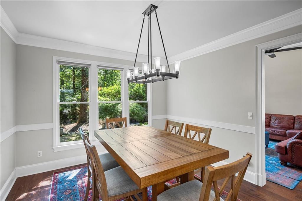 130 Belvedere Court Atlanta, GA 30350 - Photo 26 of 59 a view of a dining room with furniture window and wooden floor