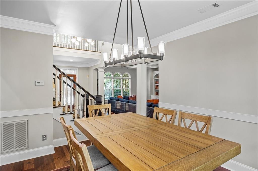 130 Belvedere Court Atlanta, GA 30350 - Photo 28 of 59 a view of a dining room with a table and chairs