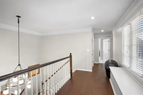 a bedroom with a bed and a fireplace