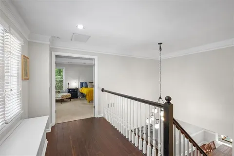 a work room with furniture and a book shelf