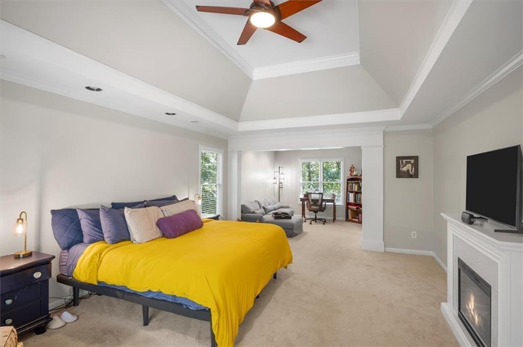 130 Belvedere Court Atlanta, GA 30350 - Photo 34 of 59 a bed room with a bed and a television