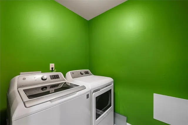 a bathroom with a sink toilet a mirror and shower