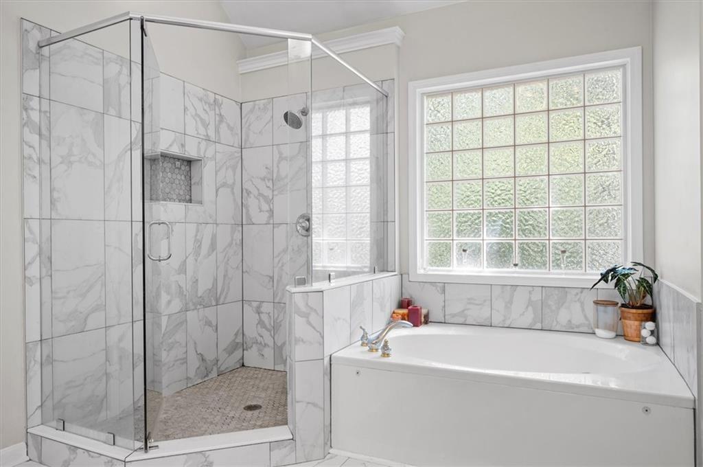 130 Belvedere Court Atlanta, GA 30350 - Photo 41 of 59 a white bath tub sitting next to a window