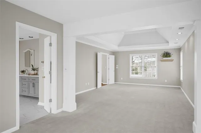 a view of a yard with snow on the road