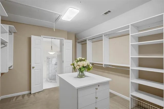 a view of a house with a yard and garage