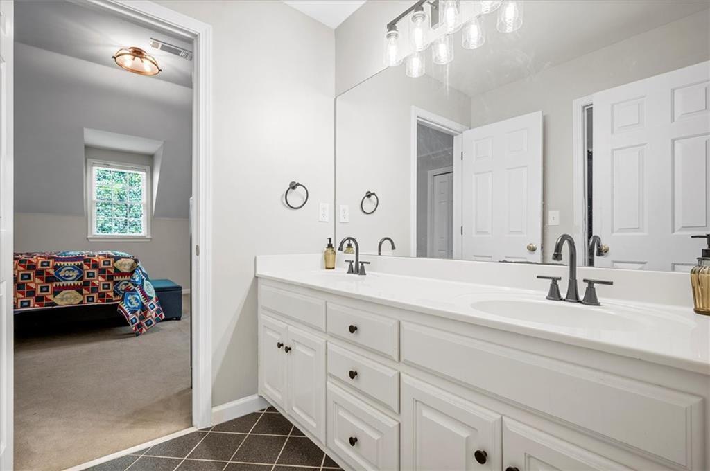 130 Belvedere Court Atlanta, GA 30350 - Photo 49 of 59 a bathroom with a sink double vanity and a mirror