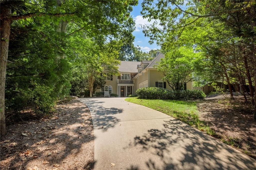 130 Belvedere Court Atlanta, GA 30350 - Photo 59 of 59 a front view of a house with a yard and garage
