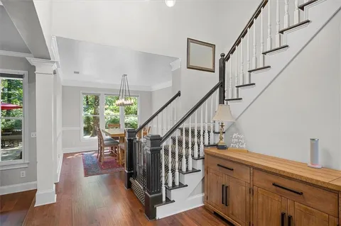 a room with a window and wooden floor