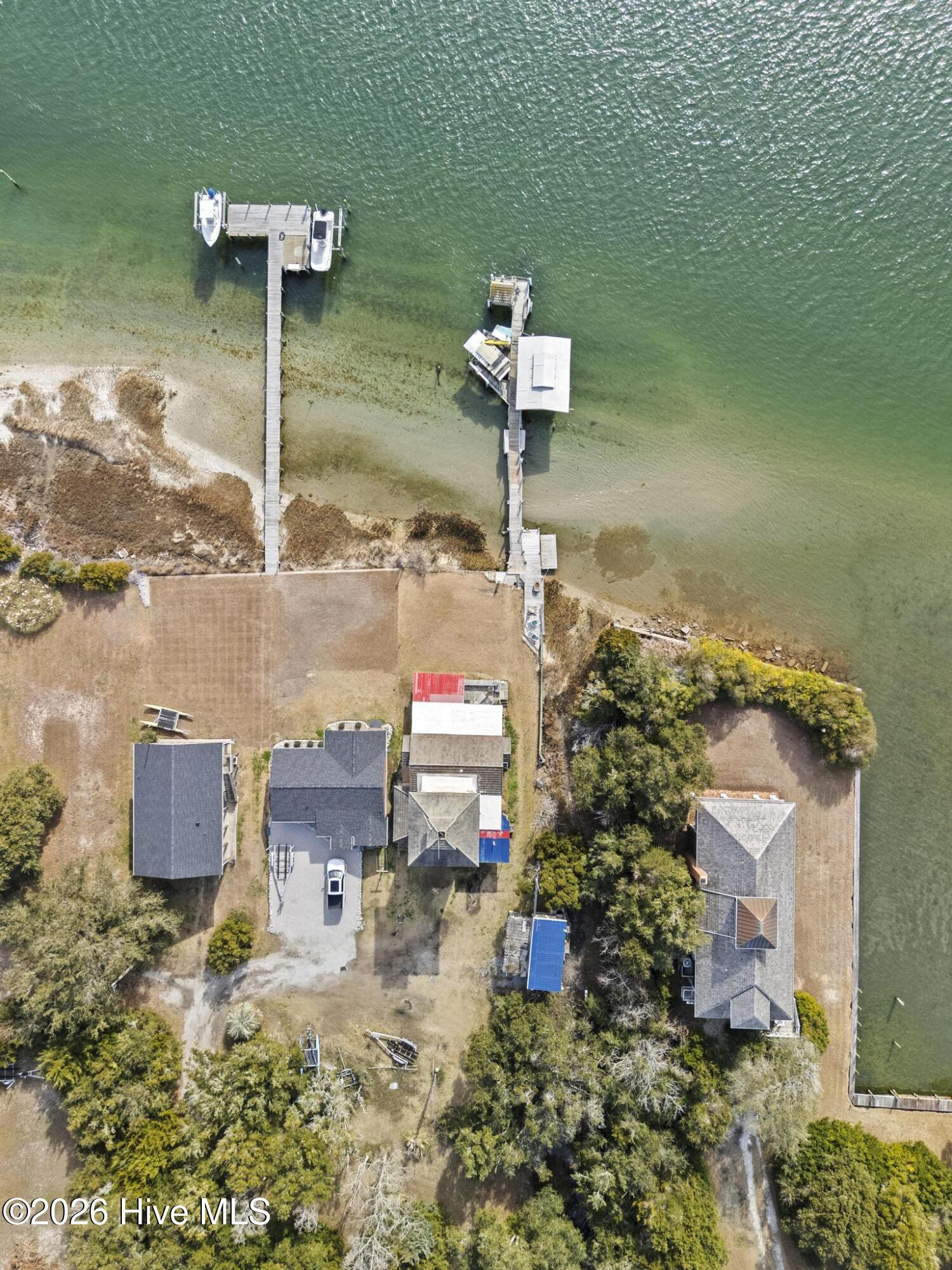 143 Capn Deck Lane Cedar Point, NC 28584 - Photo 2 of 40 DJI_20260121134258_0505_D