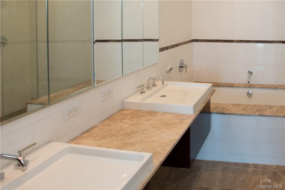 175 Huguenot Street, Unit 1801 New Rochelle, NY 10801 - Photo 11 of 26 Main bedroom full spa bath with double vanities