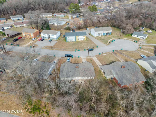 an aerial view of a swimming pool and mountain view
