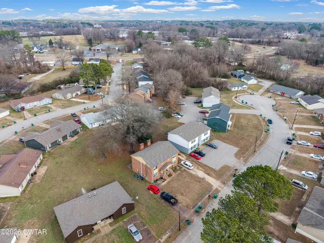 an aerial view of a city with lots of residential buildings