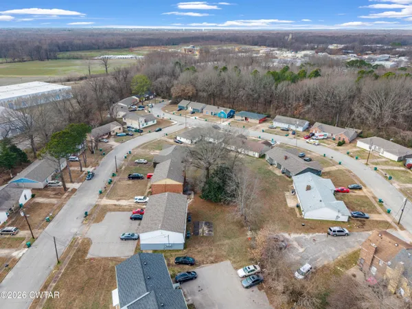 swimming pool view with a backyard space