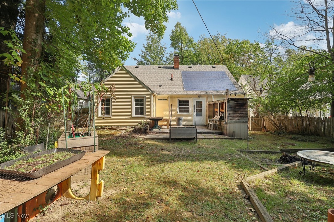 1042 Renfield Road Cleveland Heights, OH 44121 - Photo 36 of 49 Back of house with a wooden deck and a yard