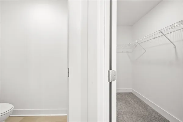 a bathroom with a bathtub shower and vanity