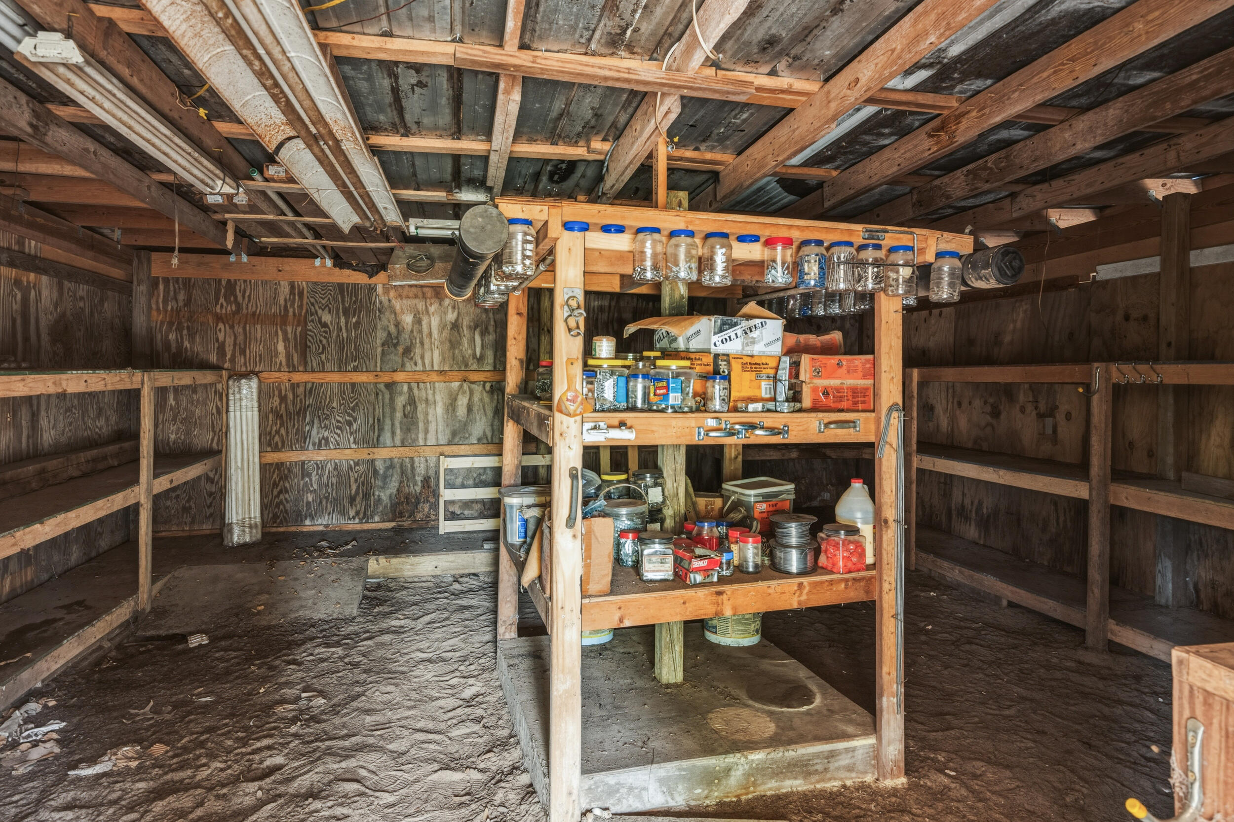 4249 Barlow Road Crestview, FL 32536 - Photo 37 of 40 a view of store room with wooden floor