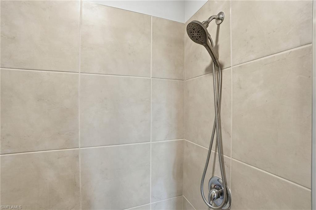 4121 68th Avenue Northeast Naples, FL 34120 - Photo 20 of 33 a bathroom with a shower