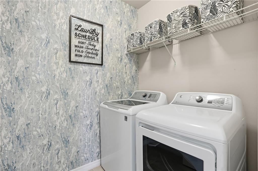4121 68th Avenue Northeast Naples, FL 34120 - Photo 25 of 33 a utility room with dryer and washer
