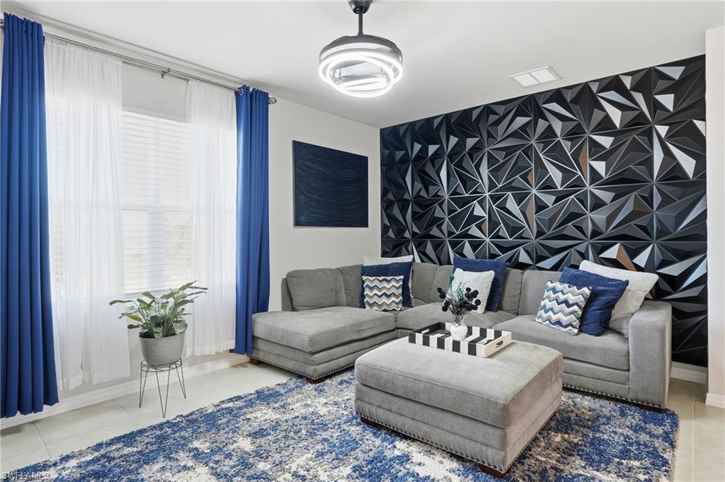 4121 68th Avenue Northeast Naples, FL 34120 - Photo 4 of 33 a living room with furniture