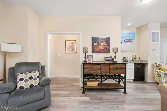 a bedroom with a bed and a chair