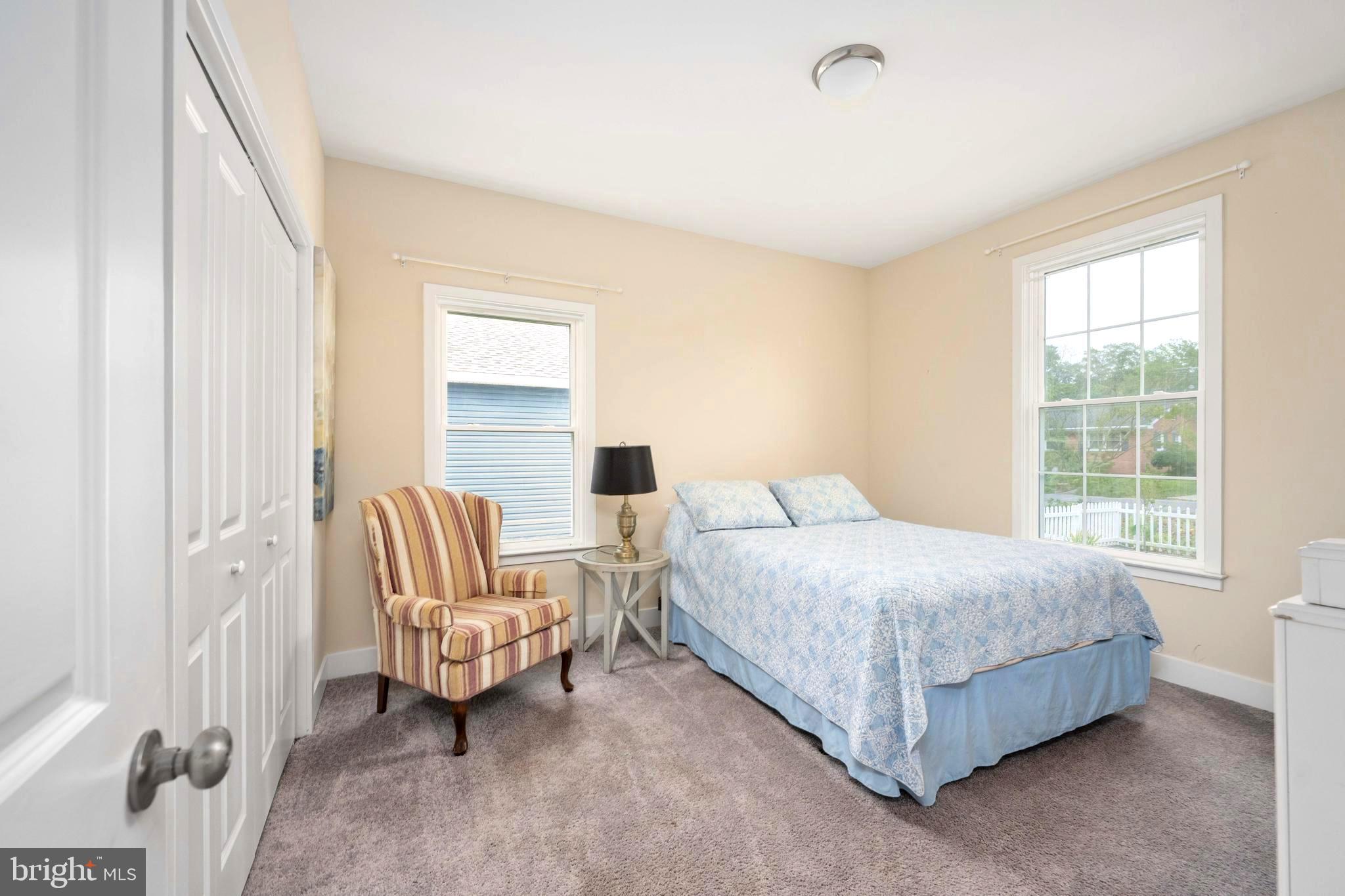 137 12th Street Colonial Beach, VA 22443 - Photo 37 of 66 a bedroom with a bed and a couch