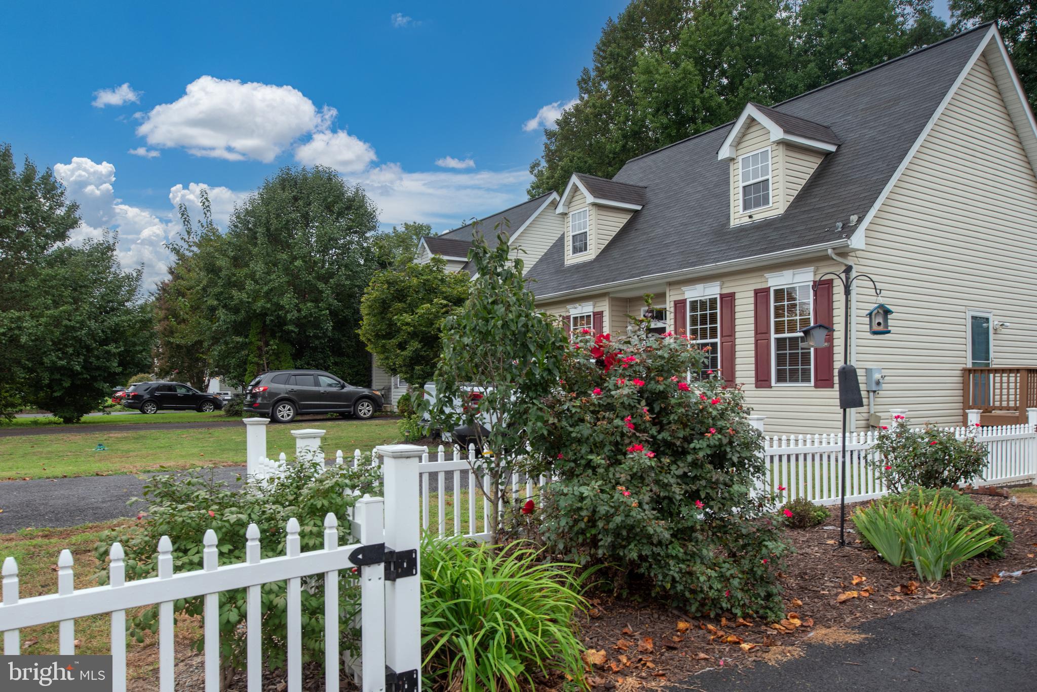 137 12th Street Colonial Beach, VA 22443 - Photo 49 of 66 a front view of a house with a yard