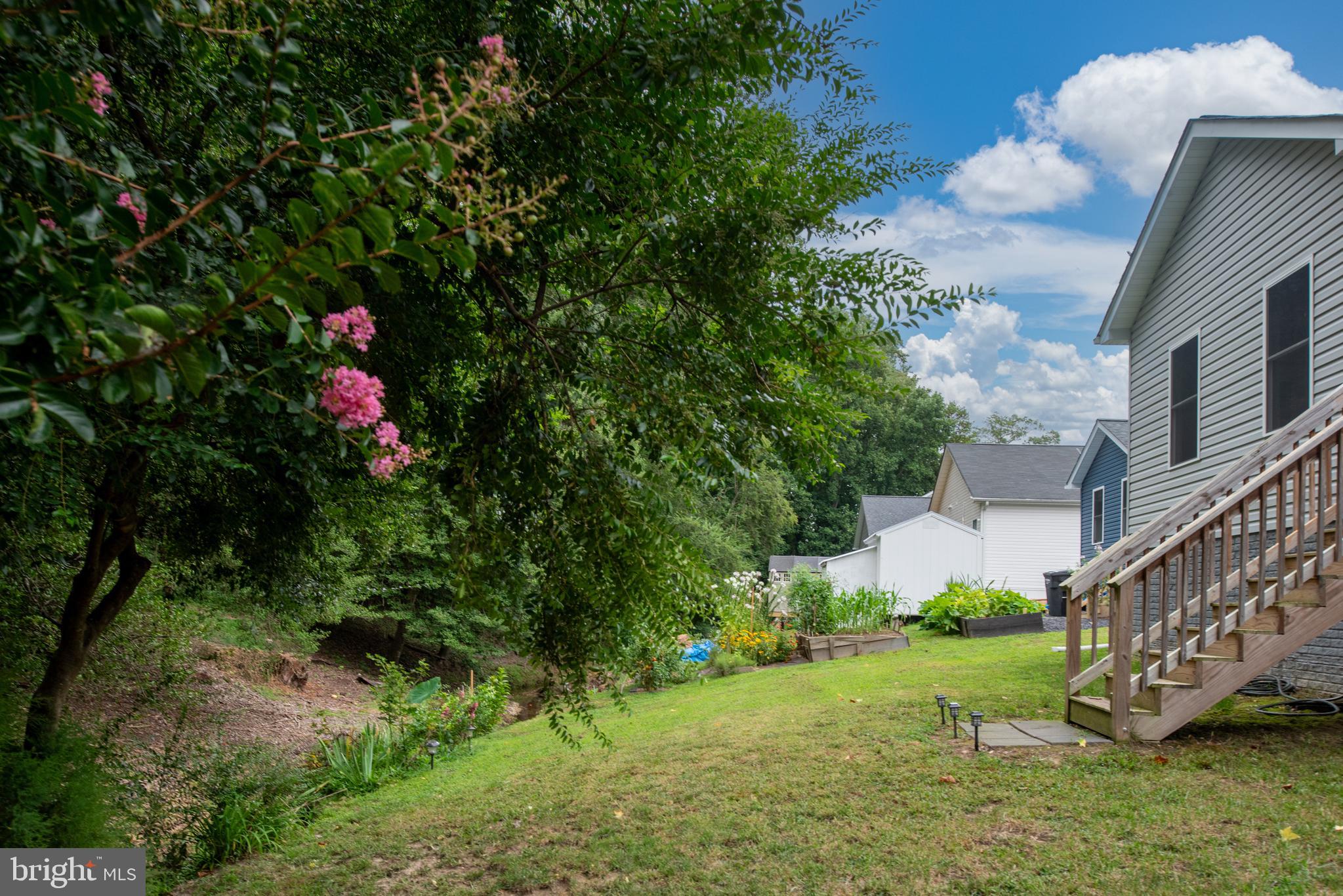 137 12th Street Colonial Beach, VA 22443 - Photo 51 of 66 a view of a house with a yard