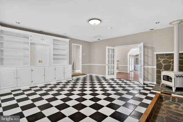 a white bath tub sitting next to a window
