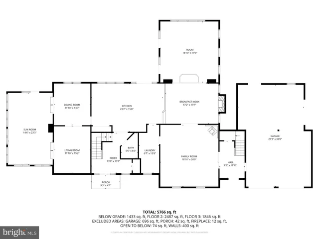 a black white and white photo of a room