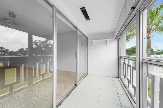 a view of a street from a balcony