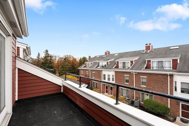 a view of balcony with a lot of trees