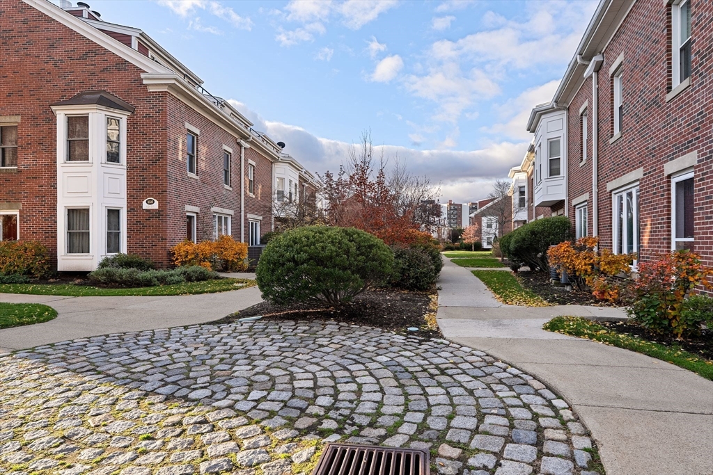 166 Quincy Shore Drive, Unit 108 Quincy, MA 02171 - Photo 34 of 36 a view of a pathway both side of house