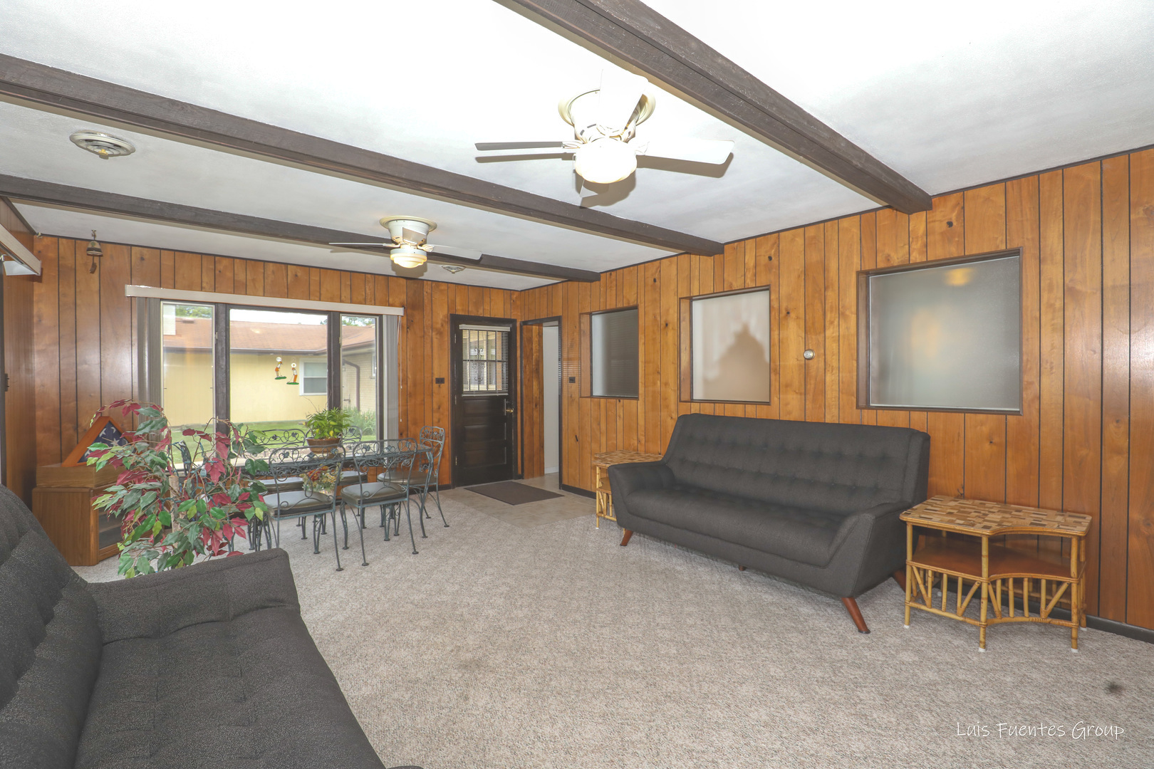 623 Wesley Drive Park Ridge, IL 60068 - Photo 12 of 23 a living room with furniture and a large window