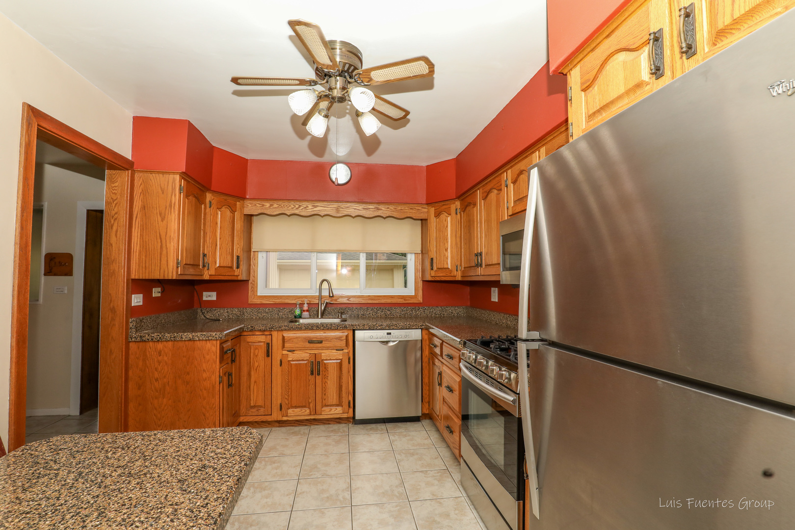 623 Wesley Drive Park Ridge, IL 60068 - Photo 9 of 23 a kitchen with stainless steel appliances granite countertop a refrigerator a sink and dishwasher