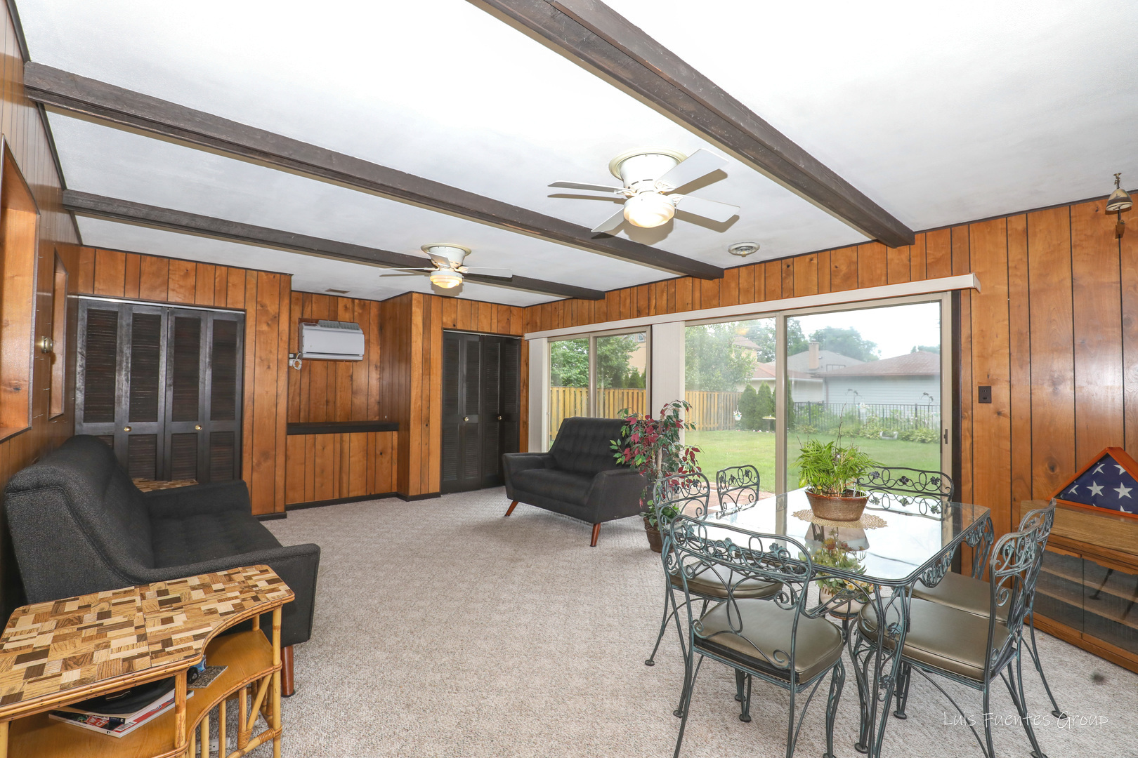 623 Wesley Drive Park Ridge, IL 60068 - Photo 10 of 23 a living room with furniture and a floor to ceiling window