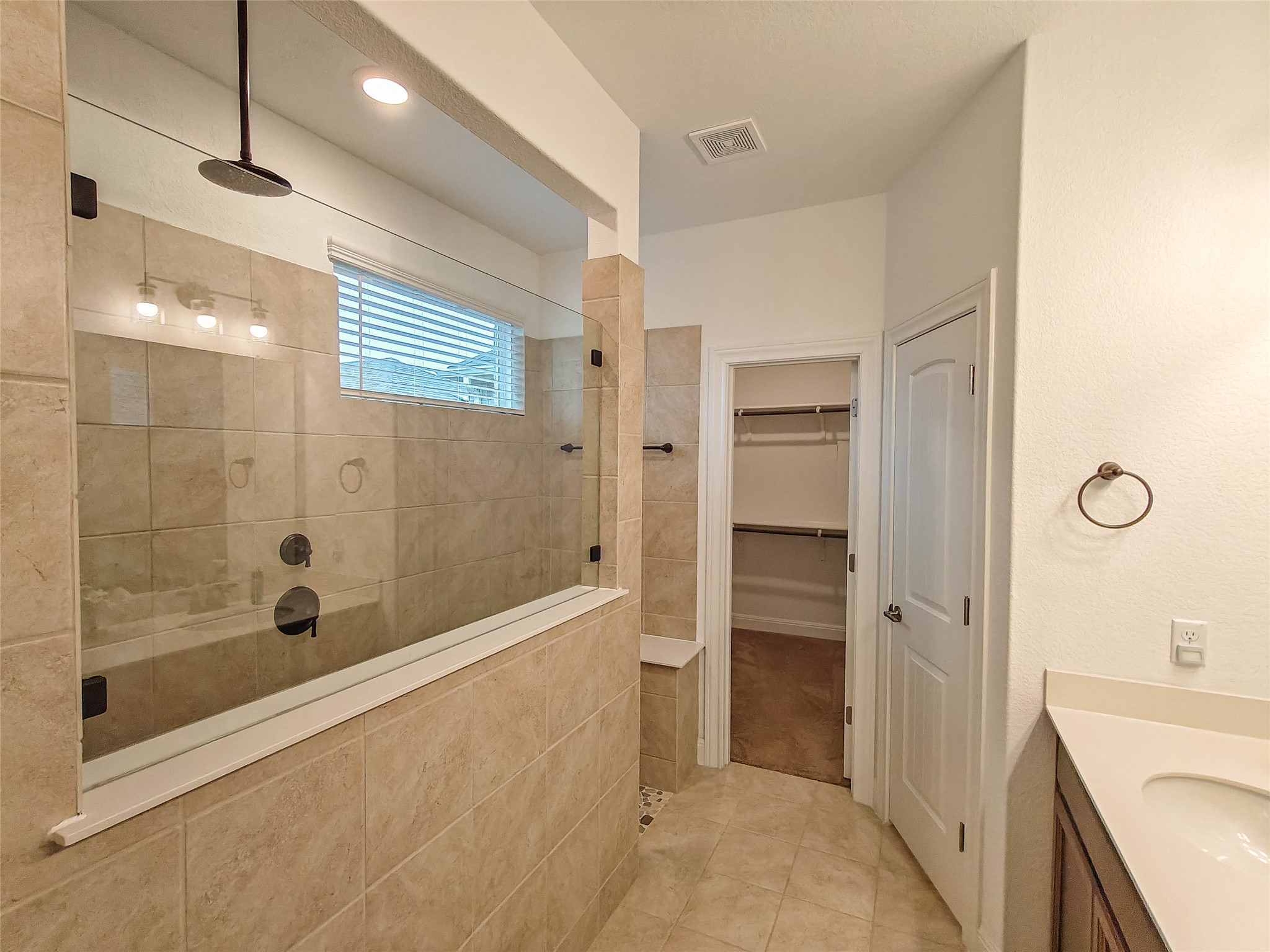 200 Fiddleneck Road Marble Falls, TX 78654 - Photo 15 of 37 a bathroom with a shower and a sink