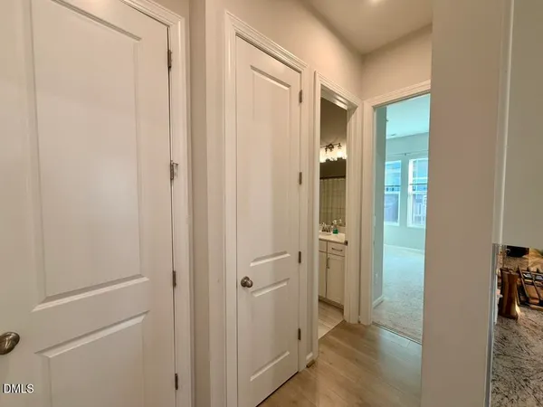 a view of a room with large windows