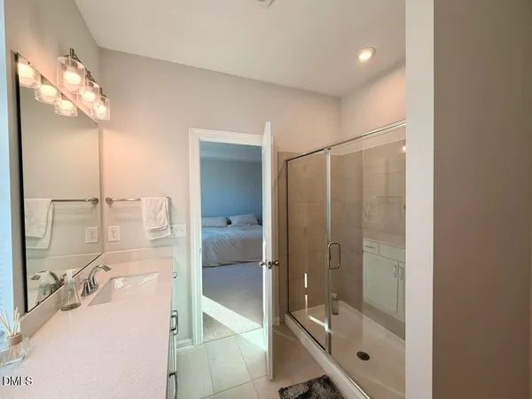 a view of a kitchen from a hallway